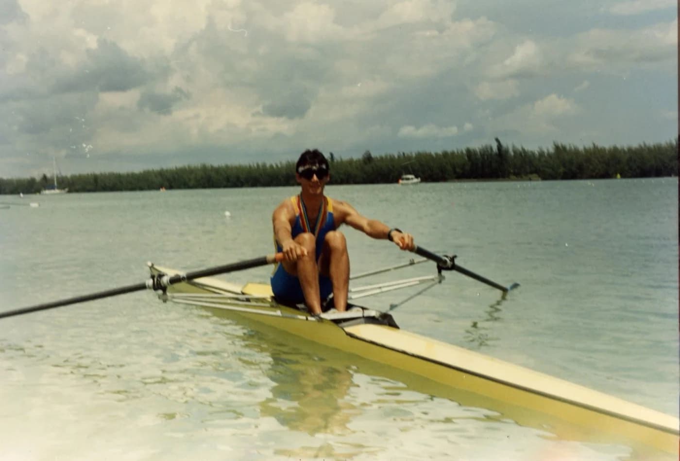 Luis rowing on the water